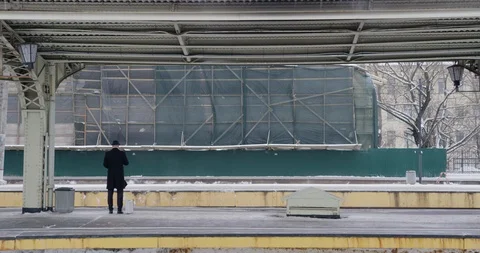 Man waiting for train Stock Footage 86513117