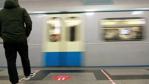A man is waiting for a train in the subway. Stock Footage 199597397