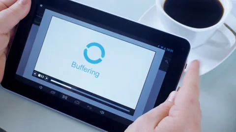 Man waiting for video buffering on tablet pc Video stock 31912158