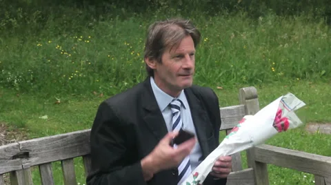 Man waits for date Stock Footage 27329753