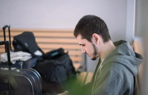 Man waits flight Foto stock