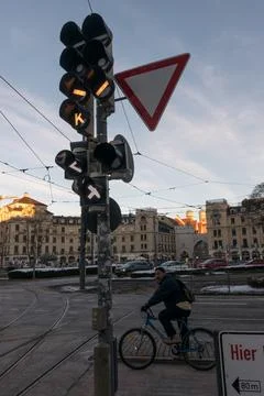 Man waits the green light on intersection Stock Photos