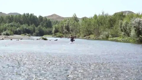 A man with the wakeboard. Stock Footage 69078627