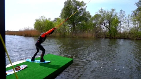 A man on a wakeboard Stock Footage 107537410