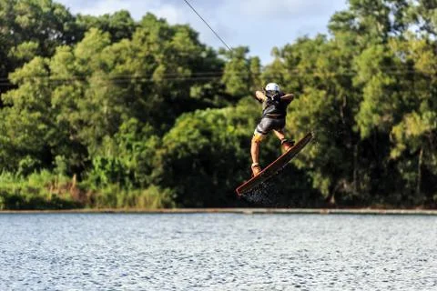 Man Wakeboarding. Jumping Foto stock