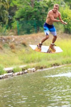 Man Wakeboarding. Jumping Stock Photos