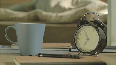 Man waking up by alarm clock and he writing for unfinished work. Stock Footage 51031061