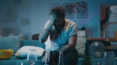 Man waking up during party Stock Photos
