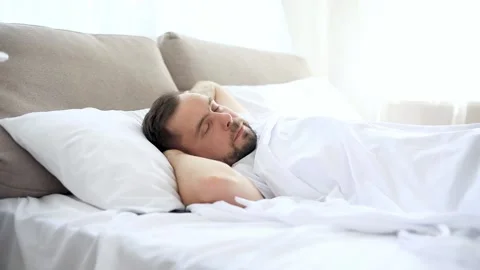 Man is waking up Stock Footage 142225382