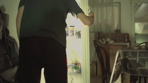 Man Waking Up Middle Night Get Quick Snack Fridge Kitchen 動画素材 112627121