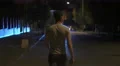 The man walk along the road. Night evening time. Wide angle. Real time capture 4k or 4k+ Resolution