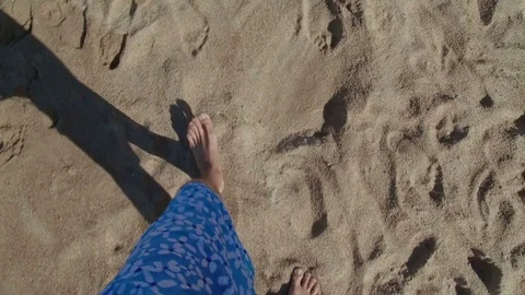 Man walk on sand beach, waves gentle wash his feet. Summer. First person view Stock Footage 70773171