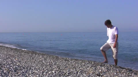 The man walk on a seaside Stock Footage 26350994