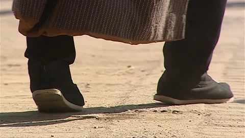 The man walked forward with heavy steps during the day Stock-Footage 276516589