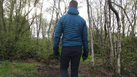 Man Walkign Through Clearing in Woods 2, 4K 動画素材 219112525