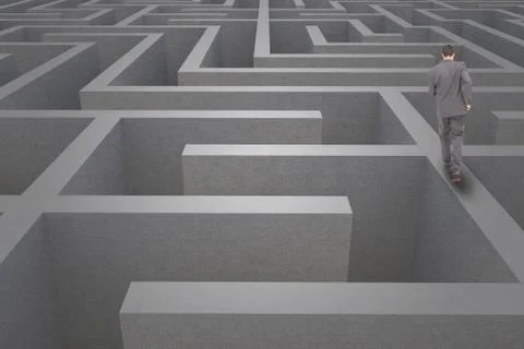 Man walking on a 3d maze Stock Photos