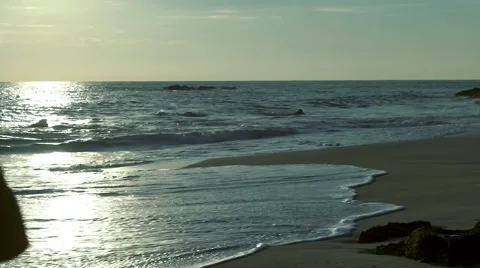 Man walking alone on the beach Stock Footage 46082509