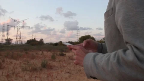 Man Walking Alone outside Texting On His Cellphone Stock Footage 75830218