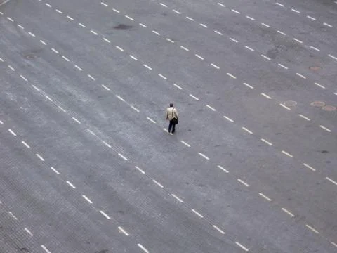 Man walking alone Stock Photos