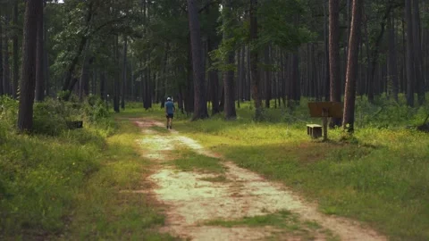 Man Walking Alone On Trail Stock Footage 201314002