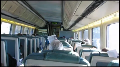 Man walking along aisle inside train 1231 Stock Footage 42710449