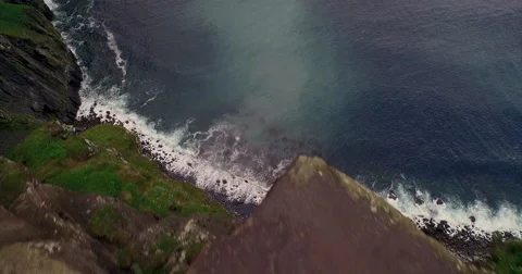Man walking along the Cliffs of Moher Video stock 58647887