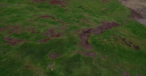 Man walking along the Cliffs of Moher Stock Footage 58647947