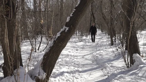 Man is walking along the path Stock Footage 88164270