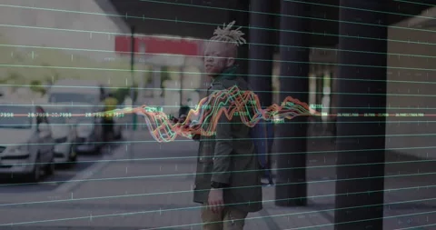 Man walking along roofed path using phone, checking area while tech wave grid Stock Footage 322119915
