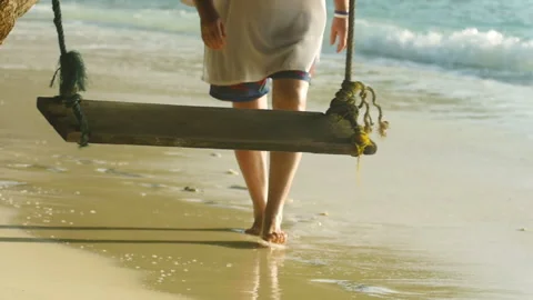 Man walking along the seashore Video stock 217410618