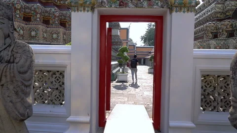 Man walking in the ancient temple and sightseeing, slow motion shot at 240fps Video stock 88157756