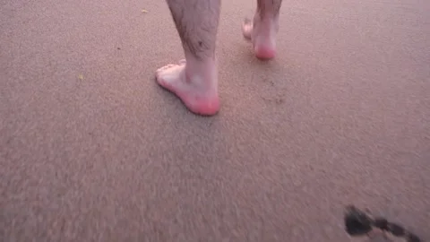 Man walking and footprints Stock Footage 237745686
