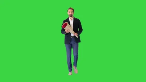 Man walking and looking at watch and holding flowers on a Green Screen, Chroma Stock-Footage 148406396