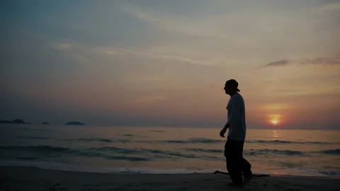 Man Walking and running Away Sunset Stock Footage 167162753
