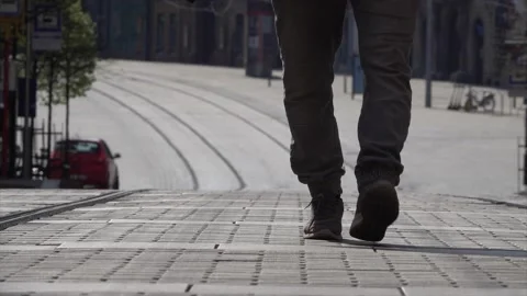 A man walking around the empty city of Brno. Covid-19 Pandemic Time Stock Footage 146399764