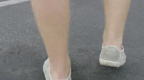 Man Walking On Asphalt Stock Footage 61951840