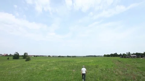 Man walking away from camera to infinity Vídeo Stock 46730907
