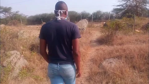 Man Walking Away on Hike Path Slow Motion Stock Footage 136783385