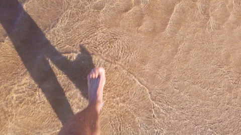 Man Walking Barefoot on Beach Waves Top View Stock Footage 331127923