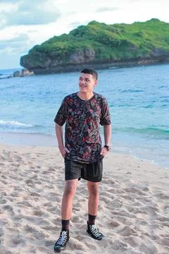 Man walking on the beach and beutifull view Stock Photos