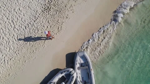 Man walking on the beach at Bimini Stock Footage 232437424