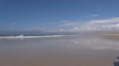 Man walking at beach Stock Footage 20543064