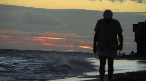 Man walking on beach. Stock Footage 48148262