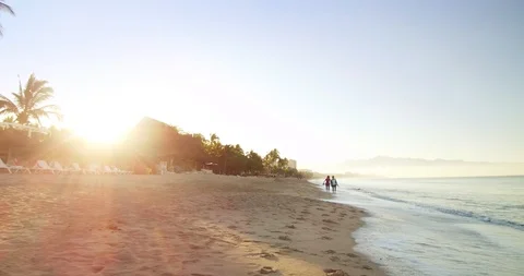 Man walking on the beach.  Stock Footage 102689413