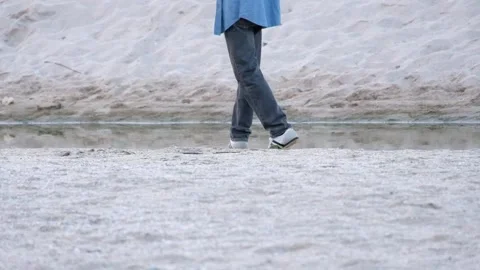 A man walking on the beach Video stock 134464544