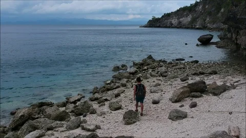 Man Walking In The Beach, Man in Beach Wanderlust,Trekking in Slow Motion Stock Footage 94389700
