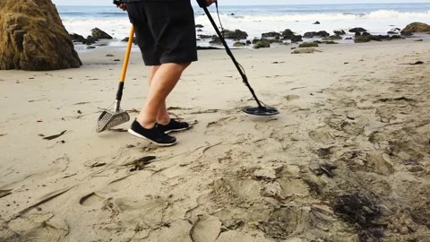 Man Walking on Beach with Metal Detector Stock Footage 155807256