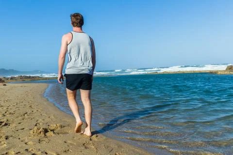 Man Walking Beach Ocean Pool Stock Photos