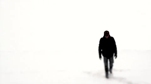 Man Walking in a Blizzard Stock Footage 162257102