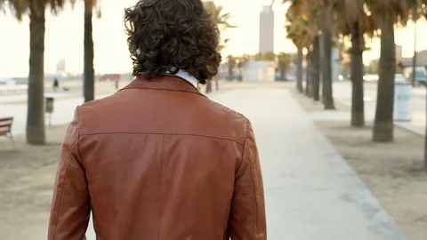 Man walking on the boulevard and chilling, steadycam shot Stock-Footage 72750119